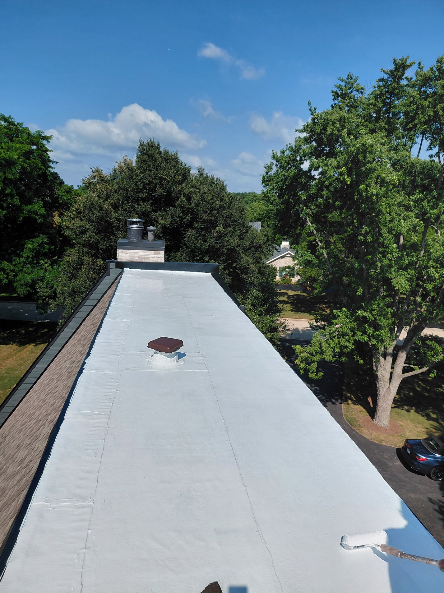 Finished white silicone coated flat roof